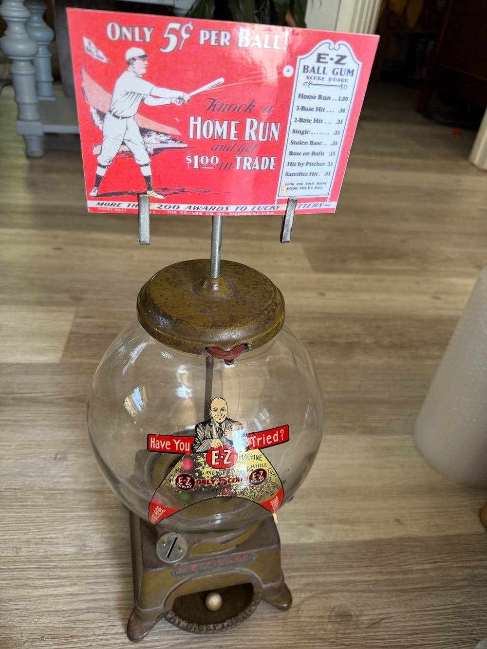 Vintage 1908 Ad-Lee EZ gumball machine.